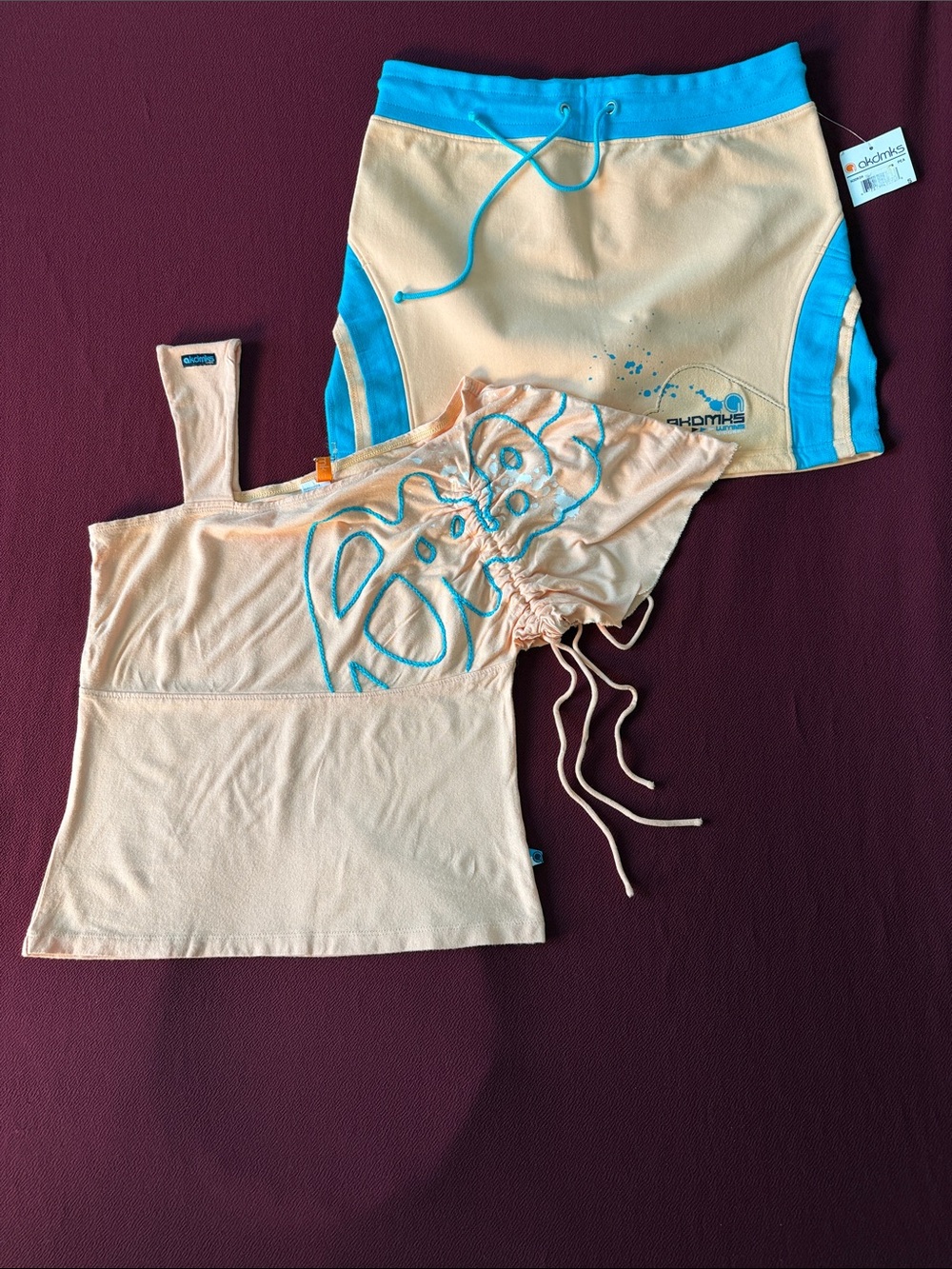 AKDMKS Peach & Turquoise Women’s Top with Drawstring Accent and Skirt Set